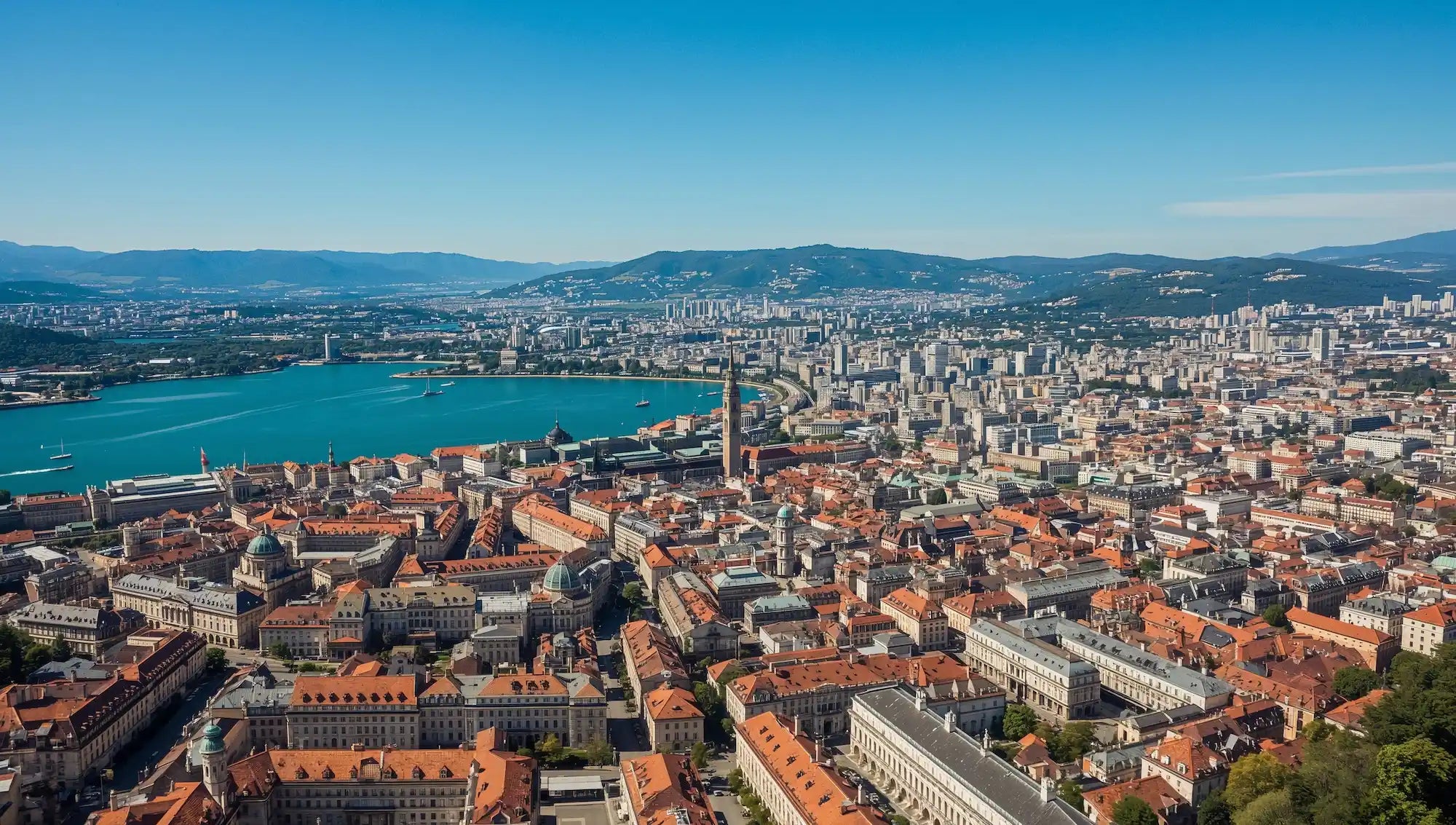 Vue aérienne de Genève et du lac Léman dans le canton de Genève, région couverte par KM Étanchéité.